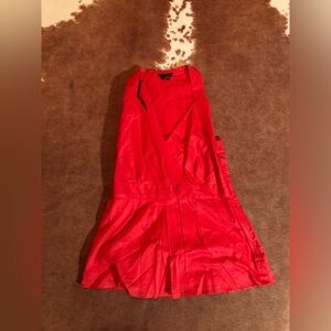 Theory red top 
size P (I'm assuming this is a standard small / petite top)